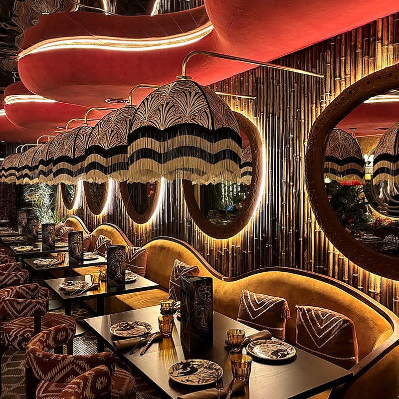 Modern Restaurant Table and Chair Set with Velvet Seats and Curved Back