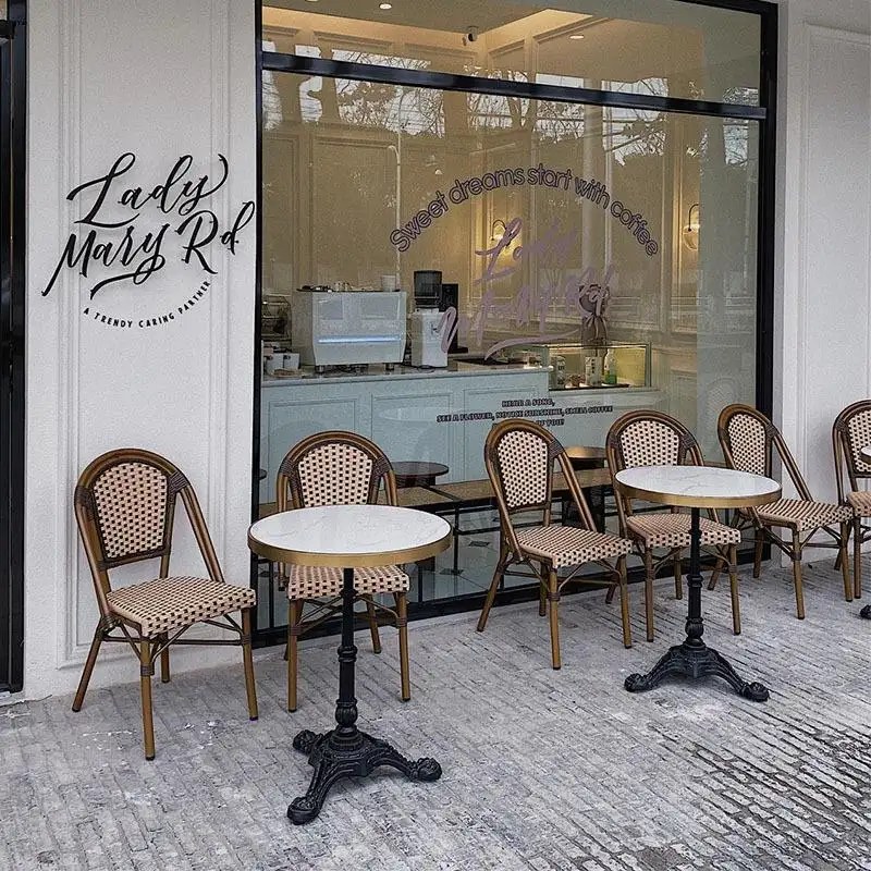 Outdoor Rattan Chairs with Marble-Top Table