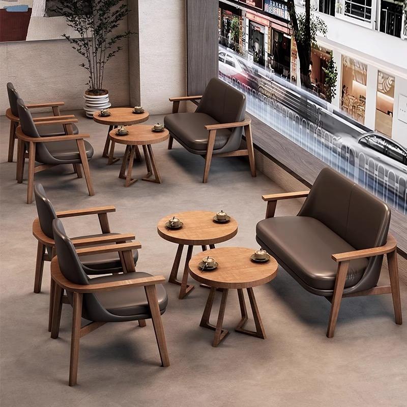 Curved-Back Chairs with Round Side Tables