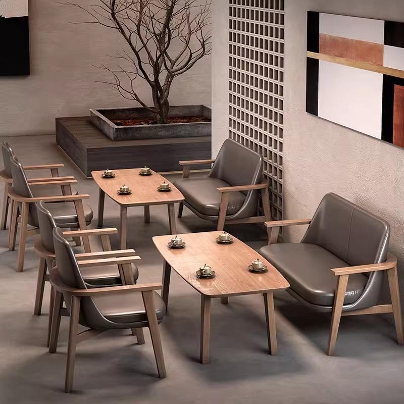 Curved-Back Chairs with Round Side Tables, second view