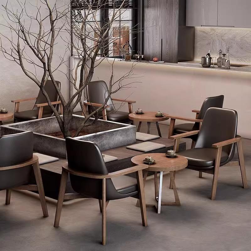 Curved-Back Chairs with Round Side Tables, third view