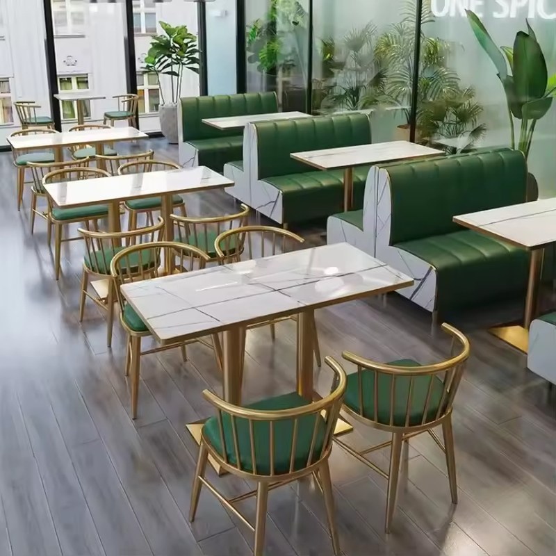 Green Velvet Booth with Marble Tables