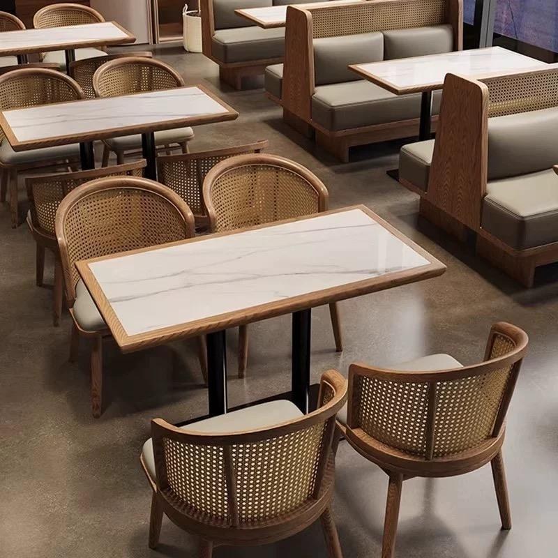 Banquette with Stone Tables and Rattan Chairs, second view