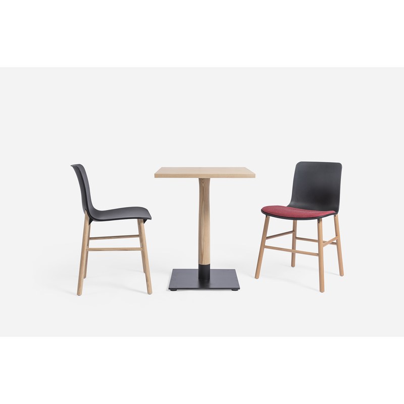 The 600 mm square ash table set between two chairs as a two-cover table