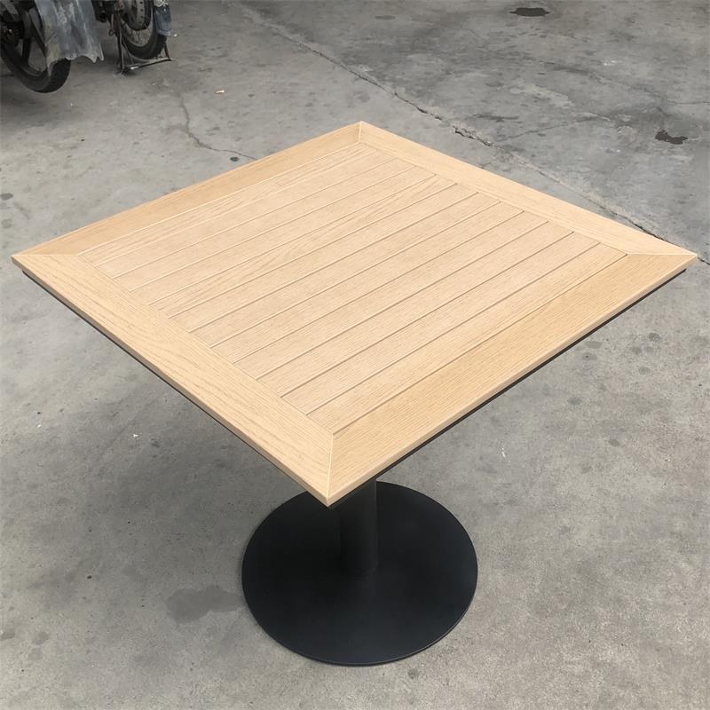 The same table from a higher angle, showing the mitred corner joints of the frame